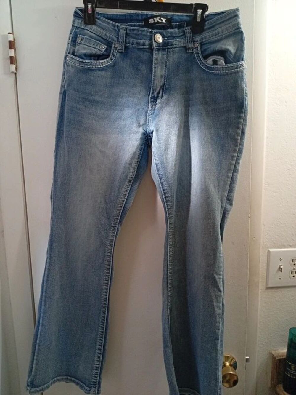 Sky brand jeans w/ skulls on back pockets. Juniors size 13/14